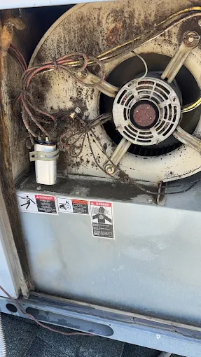 Dirty AC condenser unit needing professional cleaning and repair service Turlock CA